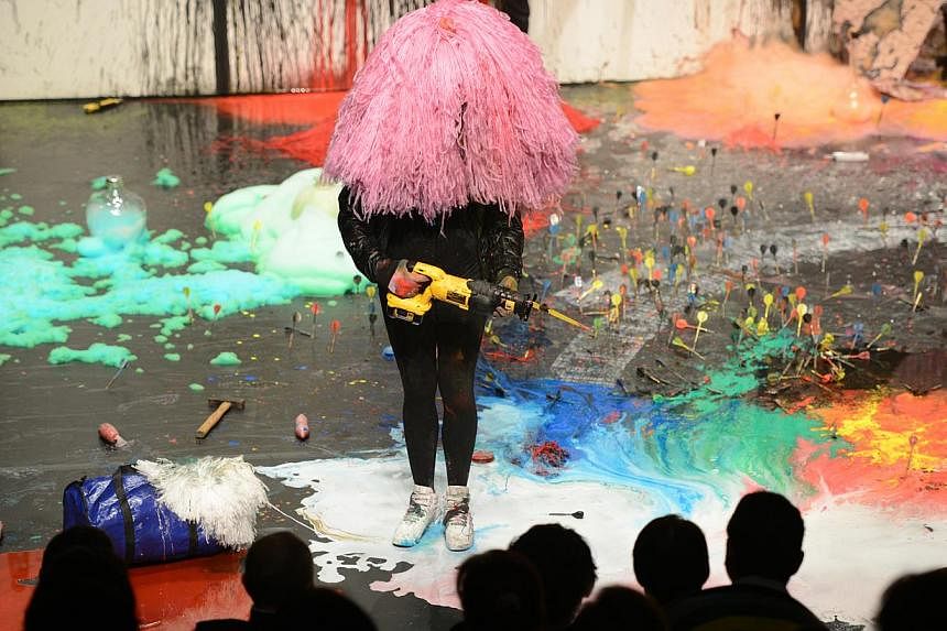 The performance Mystery Magnet, conceived by Belgian artist Miet Warlop, is a largely wordless show that speaks through a riot of colours and evocative scenes. -- PHOTO: CHONG YEW, SINGAPORE INTERNATIONAL FESTIVAL OF ARTS