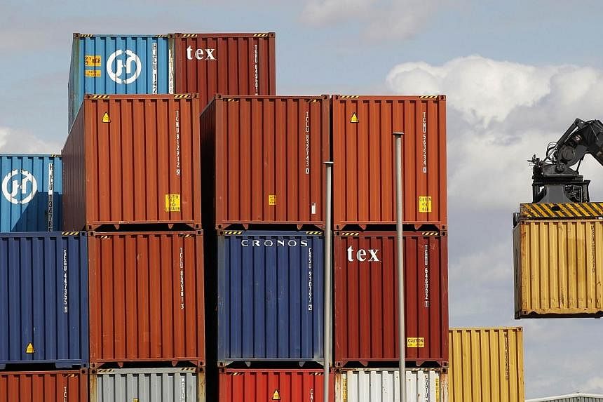 A man has died after 35 people, including several children, were found inside a shipping container being unloaded at a dock in eastern England on Saturday morning, police said.&nbsp;-- PHOTO: AFP