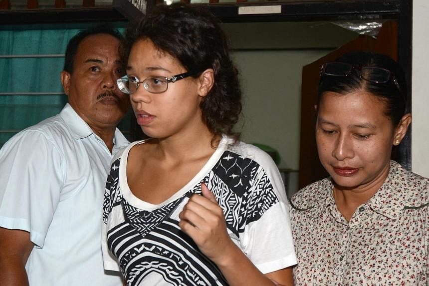Friends of an American woman beaten to death and stuffed in a suitcase in Bali said they had warned her not to take her troublesome teenage daughter Heather Mack along on vacation. -- PHOTO: AFP&nbsp;