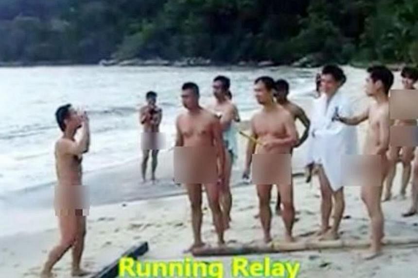 The nudists participate in a relay race in this video screengrab. -- PHOTO: THE STAR/ASIA NEWS NETWORK&nbsp;