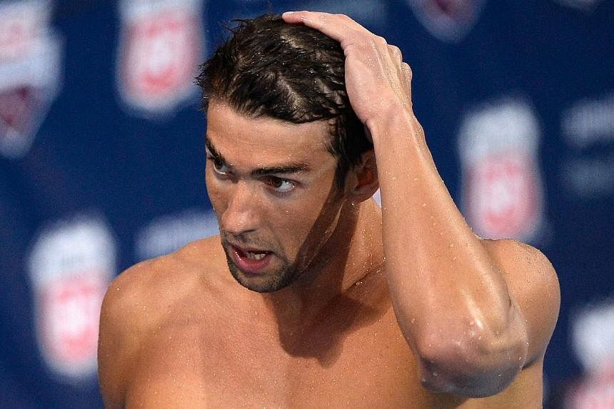 Michael Phelps leaves the pool after his race in the Men's 100m Backstroke Final during the 2014 Phillips 66 National Championships at the Woollett Aquatic Center on Aug 9, 2014 in Irvine, California.&nbsp;Phelps said on Saturday, Aug 16, 2014, it wo