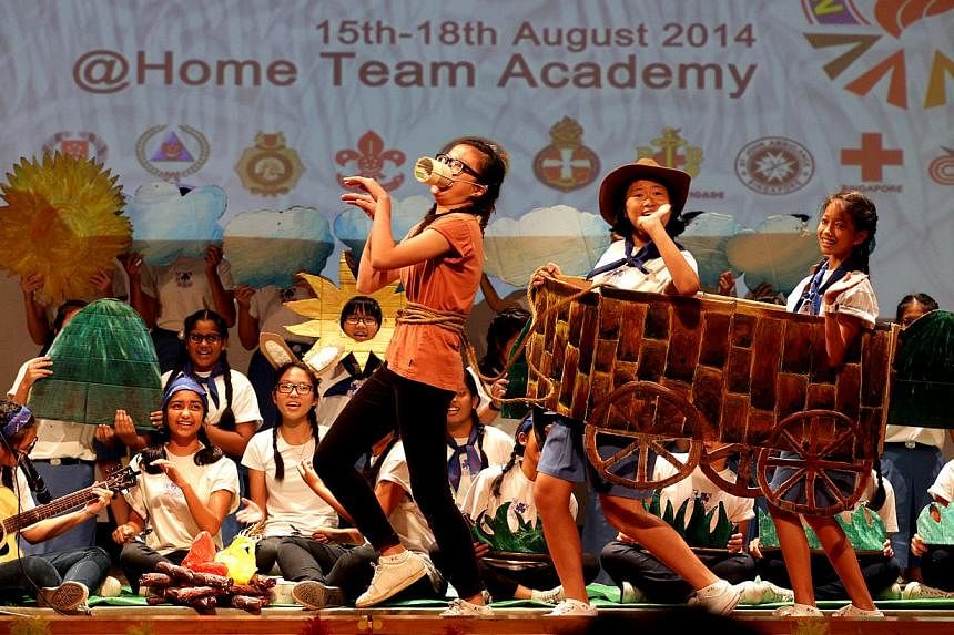 Singapore Girl Guides performing an item at the National Camp 2014. Mr Wong said the National Youth Internship Programme would start with a pilot intake of 60 members this year from uniformed groups.