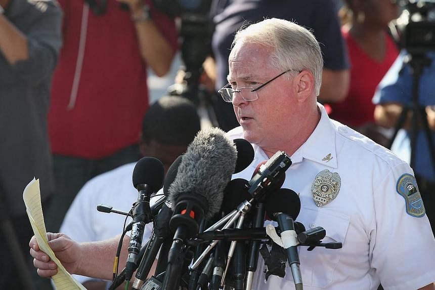 Ferguson Police Chief Thomas Jackson announces the name of the Ferguson police officer responsible for the August 9, shooting death of teenager Michael Brown on Aug 15, 2014 in Ferguson, Missouri.&nbsp;-- PHOTO: AFP