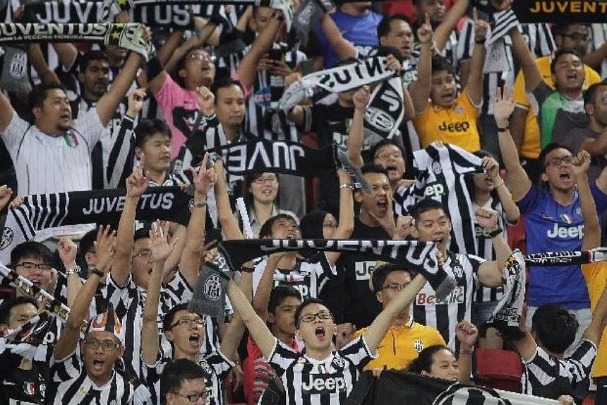 Italian Serie A champions Juventus beat a Singapore Selection side 5-0 in a friendly match at the new National Stadium on Saturday night. -- ST PHOTO: NEO XIAOBIN