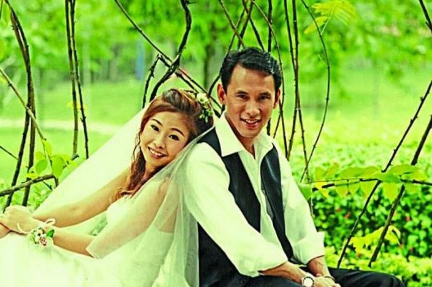 Elaine Chew and her husband Tan Size Hiang, a crew member of Malaysia Airlines Flight MH370.&nbsp;-- PHOTO: THE STAR / ASIA NEWS NETWORK