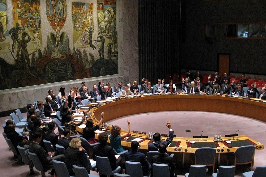 The UN Security Council votes on Aug 15, 2014 at United Nations headquarters in New York. The meeting was called to discuss threats to international peace and security caused by terrorist acts.&nbsp;The UN Security Council on Friday unanimously adopt