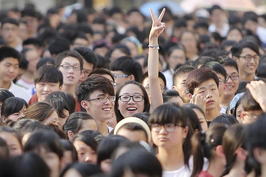 Students in Anhui province after taking the national college entrance exam. Competition for jobs is keen among the record 7.3 million graduates this year, more than seven times the number of graduates 15 years ago.