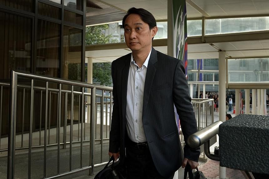 Chew Eng Han arriving at the State Courts on 11 Aug 2014.&nbsp;Former City Harvest treasurer Chew Eng Han called Kong Hee, the church founder, a liar in the first five minutes of trial today. -- ST PHOTO: KUA CHEE SIONG
