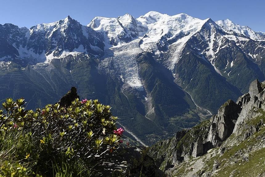 Two climbers and their guide have fallen 800m to their deaths in the Mont Blanc range, the police said on Monday, Aug 18, 2014, the latest in a series of tragedies on Europe's highest mountain. -- PHOTO: AFP