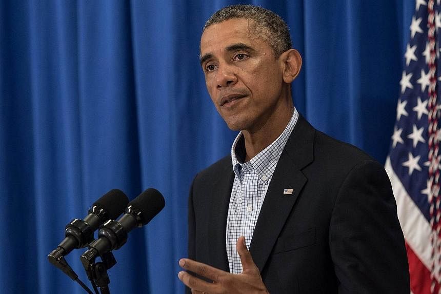 US President Barack Obama speaks on the situation in Iraq and in Ferguson, Missouri, at Martha's Vineyard, Massachusetts, on Aug 14, 2014.&nbsp;US President Barack Obama told Congress on Sunday that the "limited" airstrikes he has authorized on Iraq 