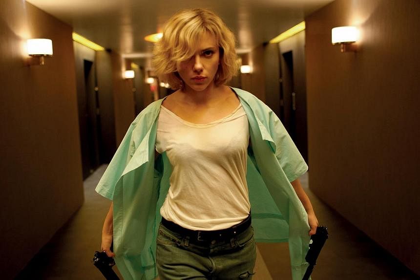 Scarlett Johansson in the movie Lucy. She plays&nbsp;a woman who ingests a drug that gives her supernormal mental powers. -- PHOTO: UIP