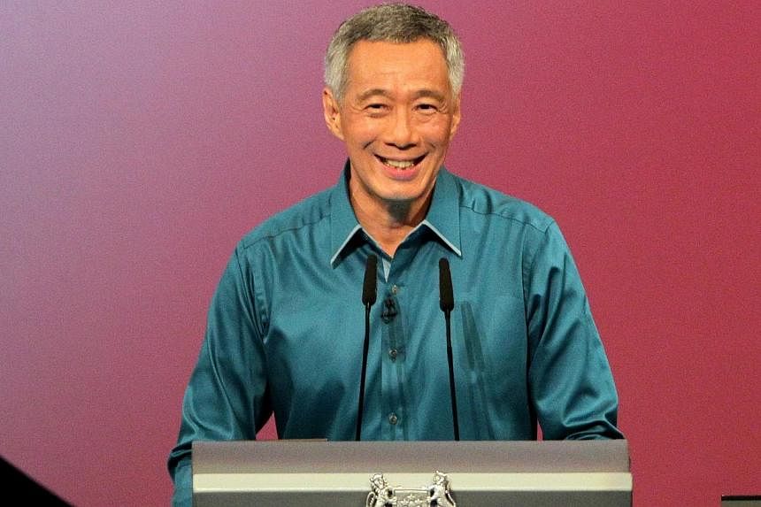 Mr Lee said home ownership and the CPF scheme - Singapore's twin pillars for ensuring that people have enough for retirement - will be improved to better support the poor and be made more flexible for all. -- ST PHOTO: NEO XIAOBIN