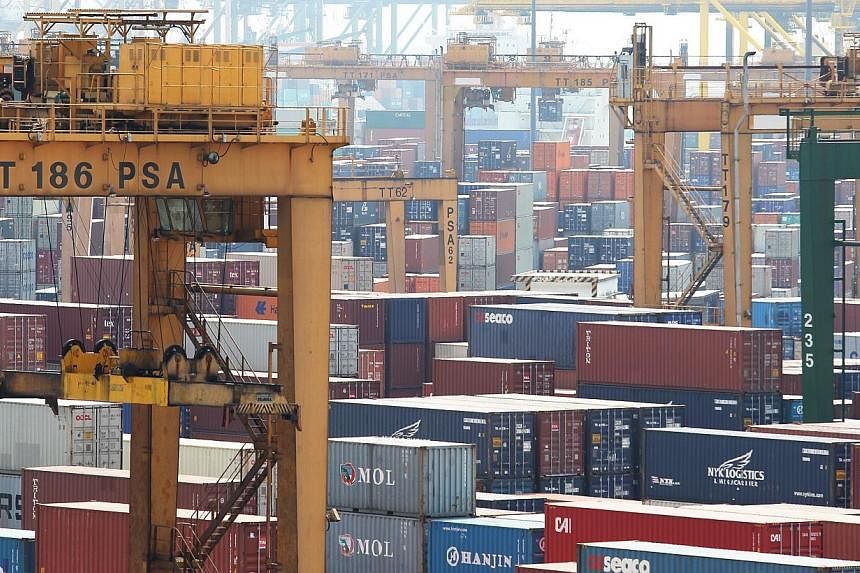 Non-oil domestic exports slid 3.3 per cent over the previous year, after falling 4.6 per cent in June and 6.6 per cent in May. -- PHOTO: ST FILE