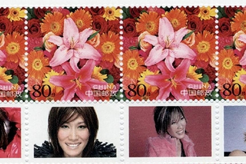 The stamps made by the Chinese government in honour of Ho Yeow Sun's contribution&nbsp;to charity work. -- PHOTO: ST FILE