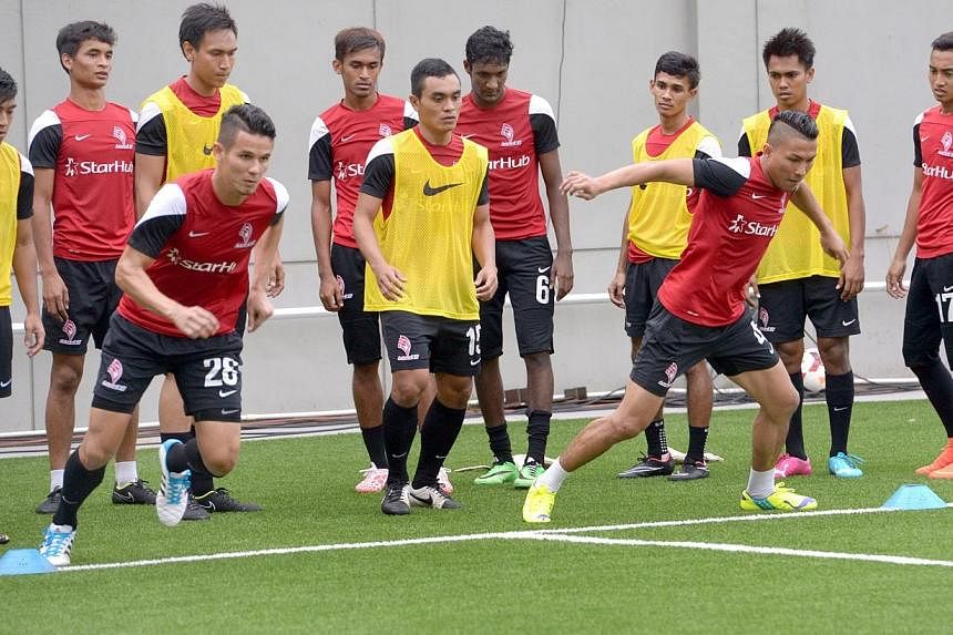 LionsXII train a day ahead of their Malaysia Cup match, Jalan Besar Stadium, on Aug 12, 2014.&nbsp;The LionsXII's Malaysia Cup group match against Johor Darul Takzim II has been postponed from Friday, Aug 22, to a day later. -- PHOTO: ST FILE