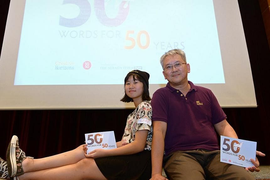 Mr Mokthar Ismail, 51, with his daughter Sofia Amanda Bening, 16. Both father and child were runners-up in their respective age bands. -- ST PHOTO: NG SOR LUAN