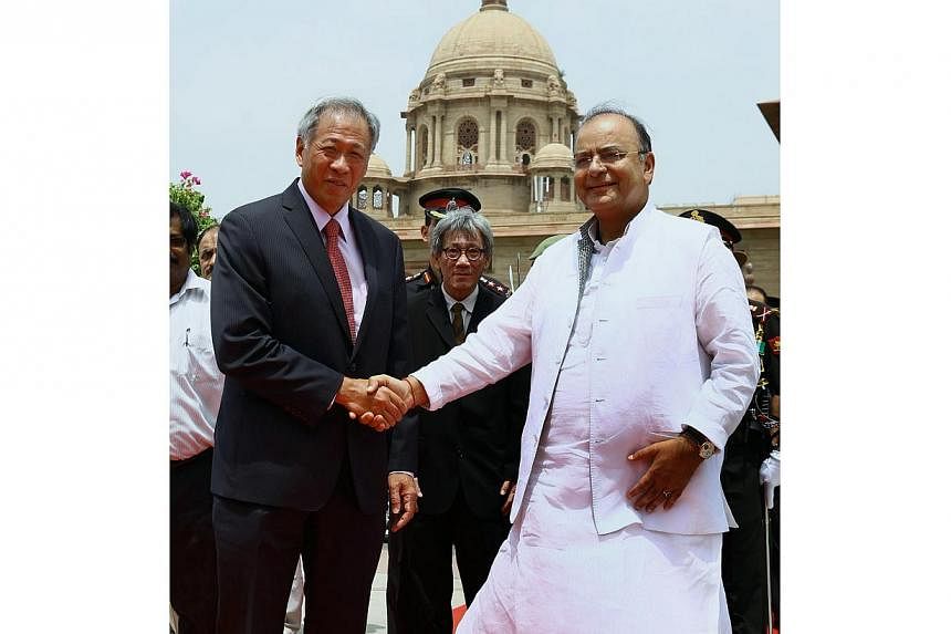 A photograph received from the Ministry of Defence on August 19, 2014 shows Singapore Defence Minister Ng Eng Hen (left) shaking hands with Indian Defence Minister Arun Jaitley at South Block in New Delhi. Dr Ng said events in Syria and Iraq, and inc