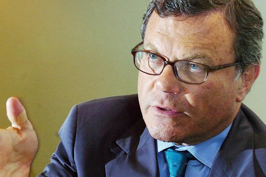 Martin Sorrell, pictured here in 2007 and who heads up marketing giant WPP, took home a pay package nearly 800 times bigger than his employees of £29.8 million (S$62 million), the study found. -- PHOTO: BUSINESS TIMES FILE