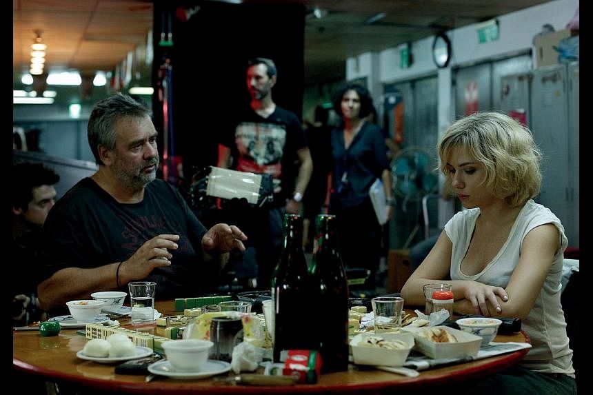 Luc Besson on why in Lucy the bad guys, led by Oldboy actor Choi Min Sik, are Koreans. Besson is seen here with the film’s lead Scarlett Johansson (both above). -- PHOTO: UNIVERSAL PICTURES