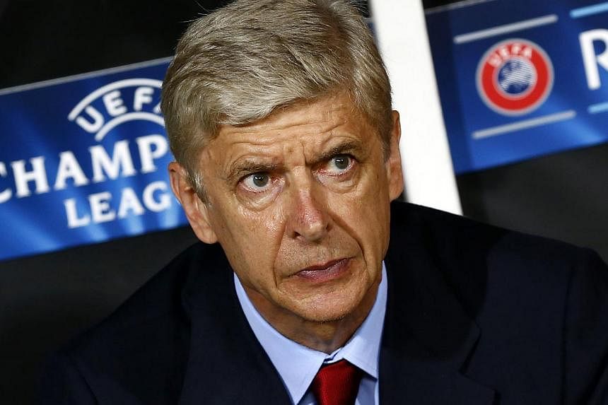 Arsenal's coach Arsene Wenger is pictured during the first leg of their Champions League qualifying soccer match against Besiktas at Ataturk Olympic stadium in Istanbul on Aug 19, 2014. -- PHOTO: REUTERS
