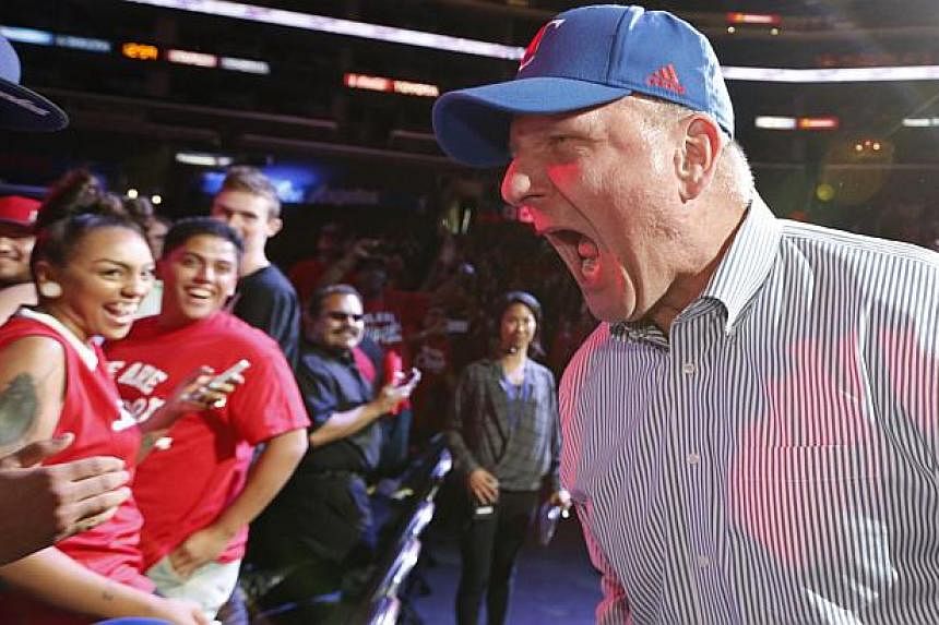 Los Angeles Clippers' new owner Steve Ballmer is introduced at a fan event in Los Angeles, California August 18, 2014. The former Microsoft CEO has quit the software company's board to devote more time to the team. &nbsp;-- PHOTO: REUTERS