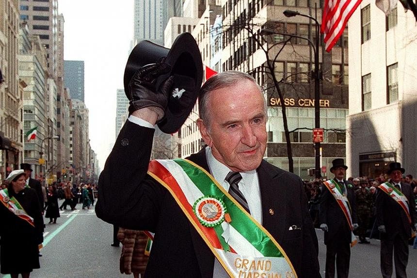 A file picture taken on March 17, 1998, shows former Irish prime minister Albert Reynolds raising his hat to the crowd during the St Patrick's Day parade in New York.&nbsp;Mr Reynolds, a central figure in the Northern Ireland peace process who helped