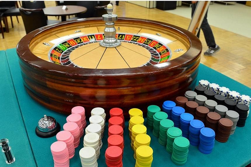 A roulette table being displayed at a Tokyo department store on Aug 20, 2014.&nbsp;Nearly 5 per cent of Japanese adults are addicted to gambling, a rate up to five times that of most other nations, according to a study. -- PHOTO: AFP