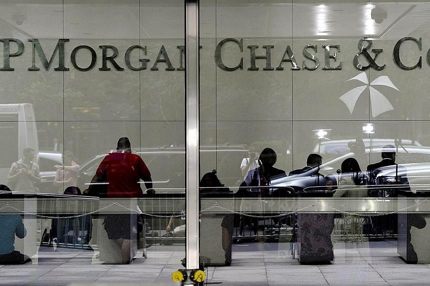 This July 13, 2012 file photo shows the entrance to the JP Morgan Chase World Headquarters on Park Avenue in New York. -- PHOTO: AFP