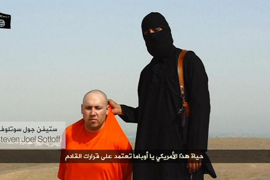 The US airstrikes come amid Islamic State militants' threats to kill&nbsp;US journalist Steven Sotloff, seen here in a still from a video released online on Tuesday which also showed the beheading by militants of US journalist James Foley in retaliat