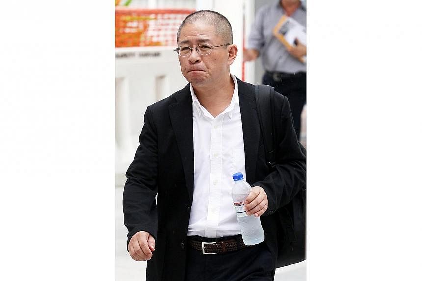 Restaurant manager Susukida Ryuji&nbsp;was fined $4,500 on Friday for causing grievous hurt to a nurse who suffered chemical burns on her buttocks after sitting down on corrosive detergent leaked onto a MRT seat. -- PHOTO: LIANHE ZAOBAO