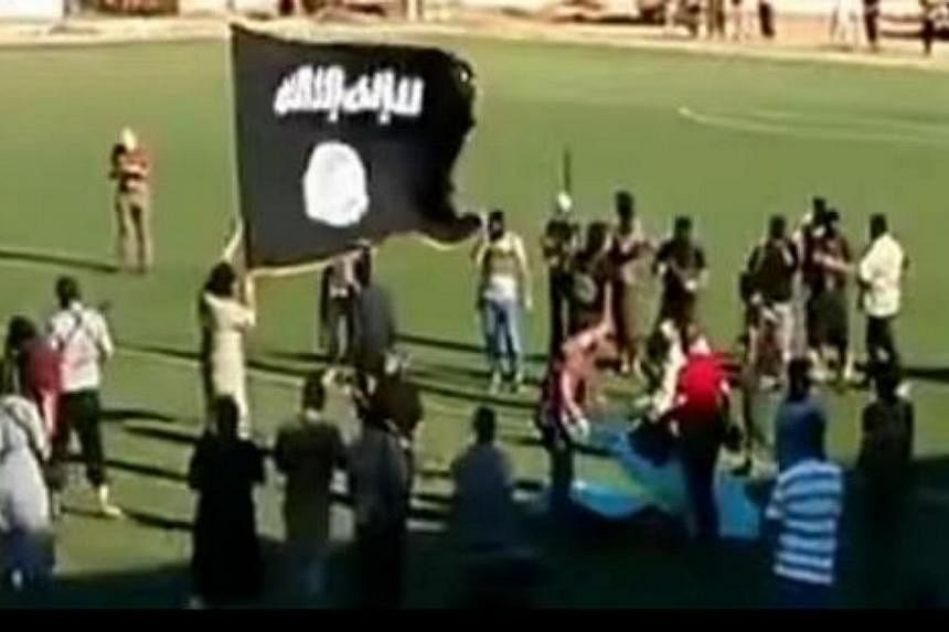 An Islamist armed group carried out a videotaped execution of an Egyptian man in a football stadium in Libya, in what Amnesty said on Friday highlighted the country's descent into lawlessness. -- PHOTO: AMNESTY INTERNATIONAL/LIBYAN PROUD/YOUTUBE