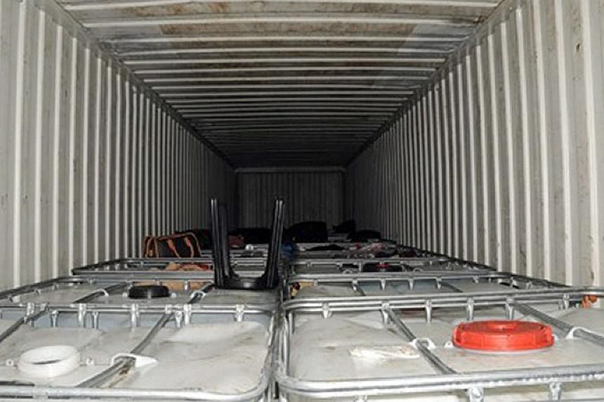 A handout picture obtained by Essex Police on Aug 21, 2014 shows the shipping container where 35 people, including a dead Afghan Sikh, were found at Tilbury Docks, East of London. -- PHOTO:&nbsp;AFP/HO/ESSEX POLICE