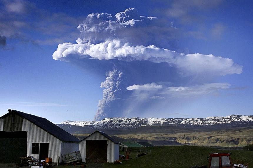 Picture taken on May 21, 2011, shows a cloud of smoke and ash over the Grimsvoetn volcano on Iceland.&nbsp;Two strong earthquakes on Sunday shook Iceland’s largest volcano, which is on red alert for imminent risk of eruption, the Icelandic Met Offi
