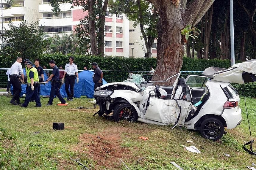 The wreckage of Mr Jamie Ho's Volkswagen Golf, after the accident on May 1, 2014.Mr Ho and his front-seat passenger&nbsp;Chen Ren-Yi were killed in the crash, and his four passengers were taken to hospital to be treated for their injuries.&nbsp;-- PH