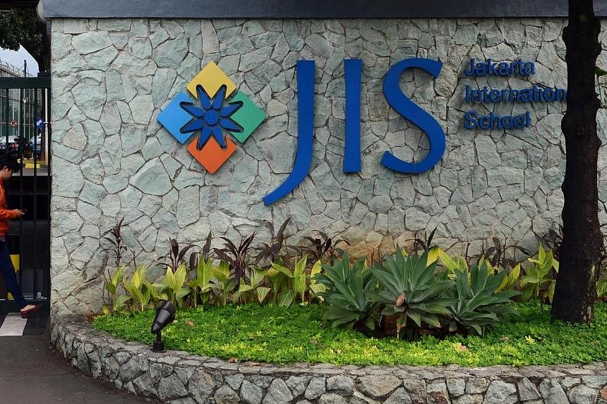 This file photo taken on April 21, 2014 shows the main entrance of the Jakarta International School in the Indonesian capital city of Jakarta. -- PHOTO: AFP