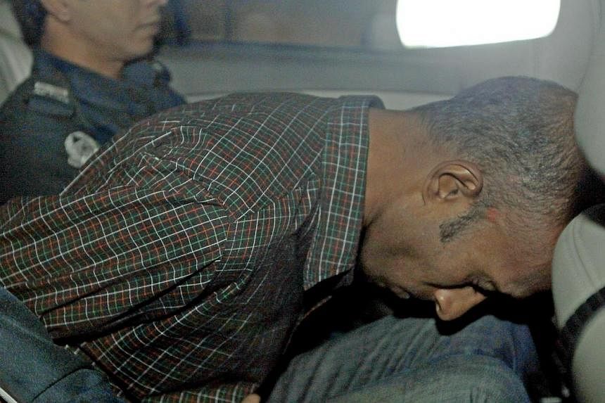 James Raj Arokiasamy, accused of hacking into the Ang Mo Kio Town Council’s website, is being driven away after a court appearance on Nov 15, 2013.&nbsp;Alleged hacker James Raj Arokiasamy was slapped with 105 additional charges of computer misuse 