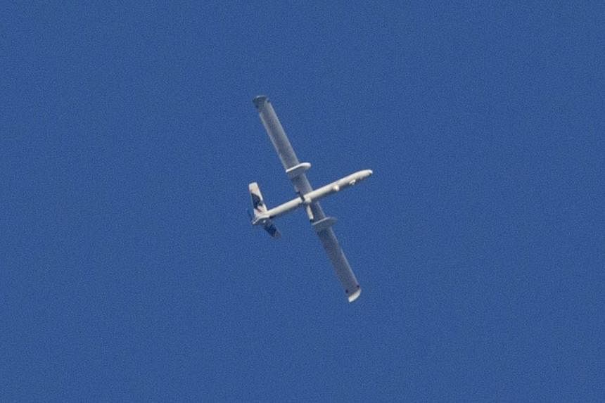 A picture taken on July 29, 2014, shows an Israeli UAV flying over the Gaza strip. An Iranian military commander said on Monday, Aug 25, 2014, that Teheran will "accelerate" arming Palestinians, after an Israeli spy drone was shot down in Iran.&nbsp;