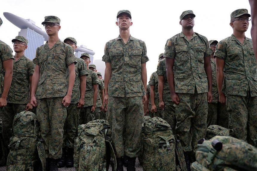 National servicemen could also obtain industry-recognised accreditation for relevant skills honed during NS so that they will be better placed to join the industry they had trained for. -- ST PHOTO: MARK CHEONG