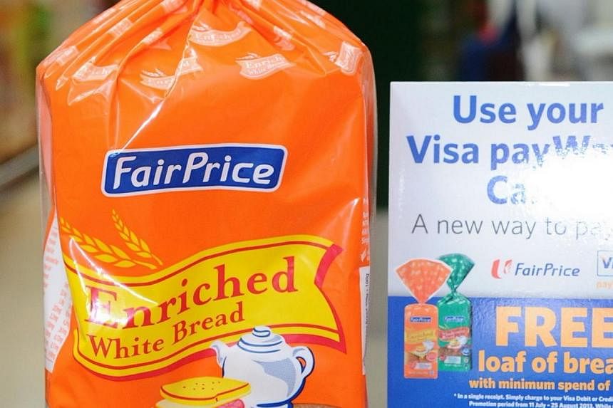 Until Sept 7, customers who purchase bread at NTUC Fairprice can help raise a projected 1.6 million dollars for needy families. -- PHOTO: ST FILE