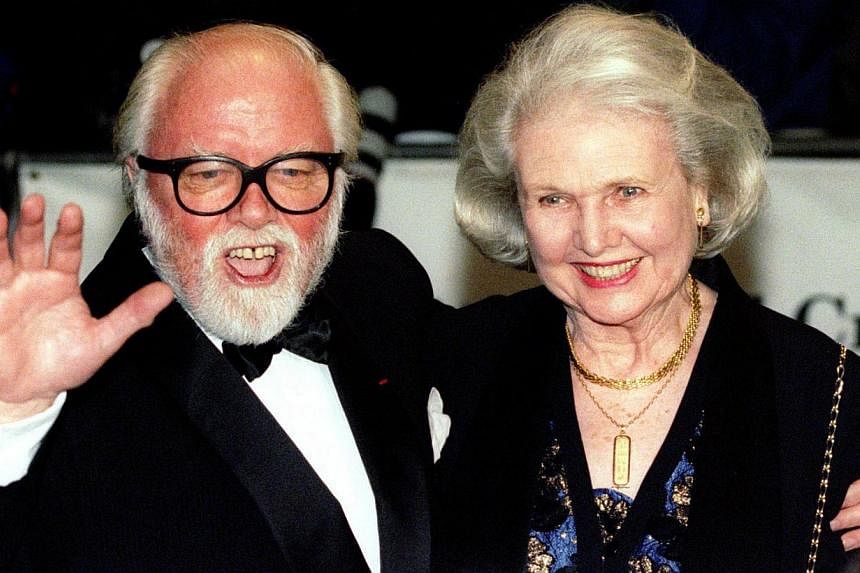 Richard Attenborough arrives at the Royal premiere of his film In Love And War with his wife Sheila Sim in London, in this file picture taken on Feb 12, 1997. -- PHOTO: REUTERS