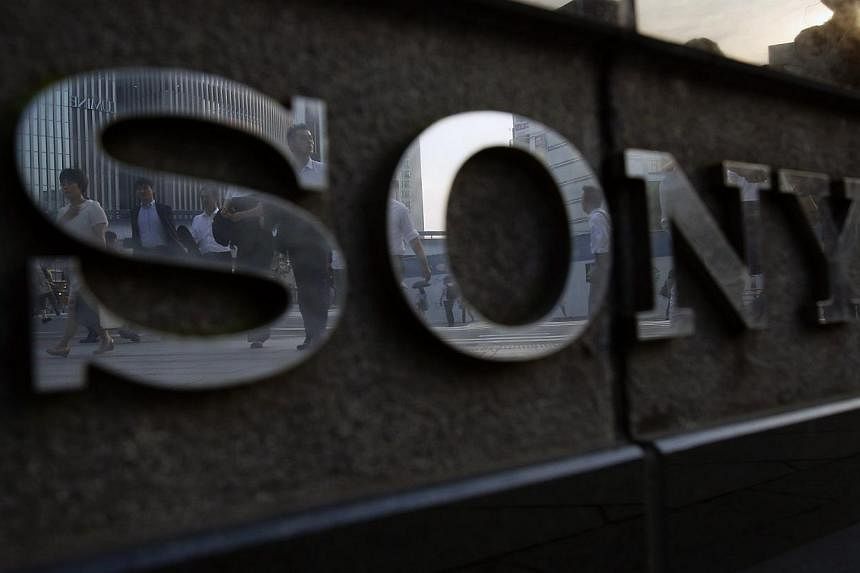Japanese entertainment giant Sony said on Monday its online music and gaming sites came under a cyber attack by a hacker group that also claimed there were explosives on a plane carrying a senior company executive. -- PHOTO: REUTERS