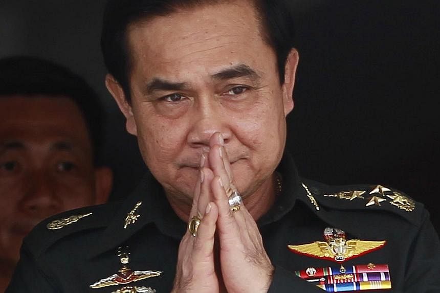 Newly-appointed Prime Minister Prayuth Chan-ocha said on Monday that he will submit his Cabinet line-up for royal endorsement within October. -- PHOTO: REUTERS