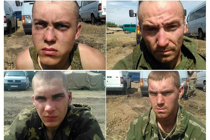 This combination of handout pictures released by Ukrainian security service (SBU) on Aug 26, 2014 purportedly shows Russian paratroopers captured by Ukrainian forces near the village of Dzerkalne, Donetsk region, some 20 to 30 kilometres from the Rus