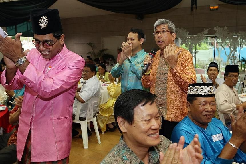 Minister for Communications and Information and Minister-in-charge of Muslim Affairs Dr Yaacob Ibrahim speaks at a Hari Raya celebration organised by the People's Association Malay Activity Executive Committees Council (MESRA) and attended by about 4