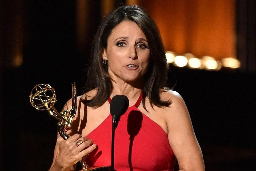Julia Louis-Dreyfus accepting her Emmy for outstanding lead actress in a comedy series for her role in Veep on Monday. -- PHOTO: AFP