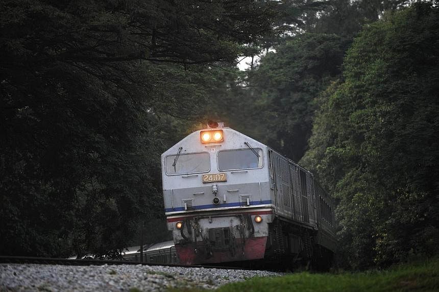 File photo of a KTM railway train in Singapore. A dispute between Singapore and Malaysia over a tax levied on parcels of former railway land will be resolved soon, with a decision by a London arbitration panel expected in a "few months". -- ST FILE P