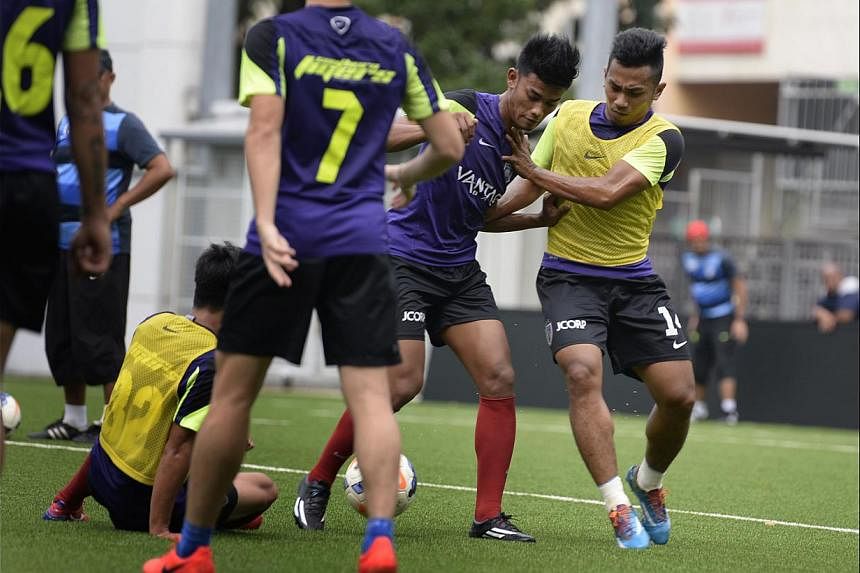 Johor Darul Takzim II player Fandi Ahmad (far right), who was named after the LionsXII coach, training at Jalan Besar Stadium. His winning goal on Saturday confirmed the senior Fandi's premonition that the player would figure on the scoresheet.