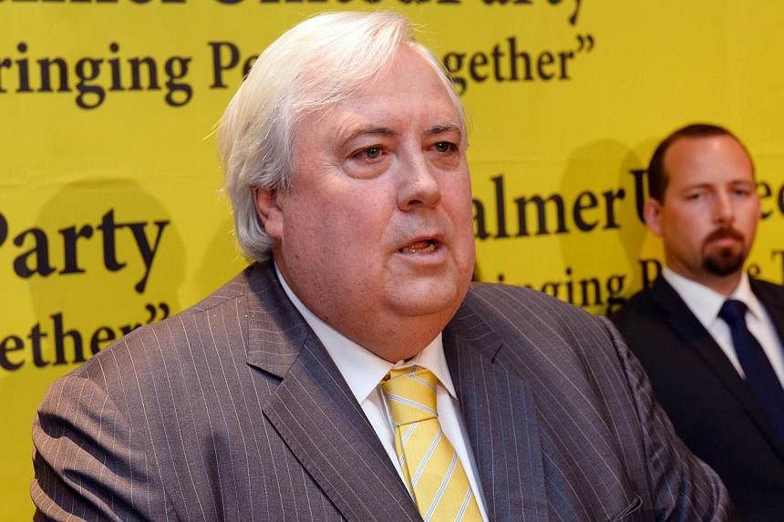 In this file photo taken on Oct 10, 2013 Australian mining billionaire and leader of the Palmer United Party (PUP) Clive Palmer speaks during a press conference in Sydney. -- PHOTO: AFP&nbsp;