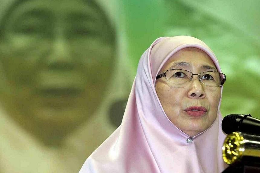 Parti Keadilan Rakyat (PKR) president Wan Azizah Wan Ismail giving her opening policy speech during the party’s 10th national congress at Stadium Melawati in Shah Alam on Aug 23, 2014. -- PHOTO: THE STAR/ ASIA NEWS NETWORK