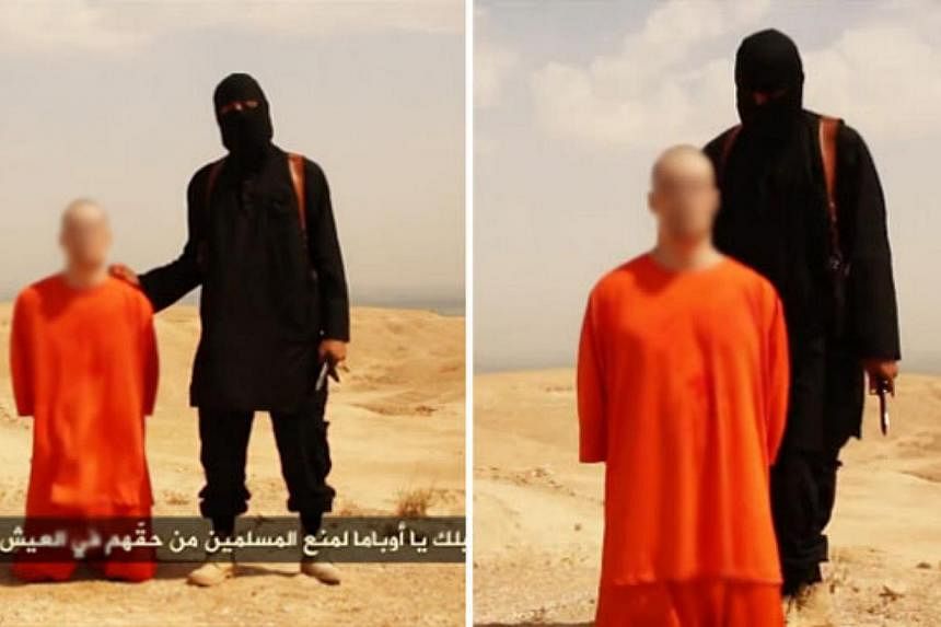 Investigators identifying the killer of American journalist James Foley now believe there are two masked fighters in the execution video - one who made the English speech and one who beheaded him. --&nbsp;PHOTO: INTERNET